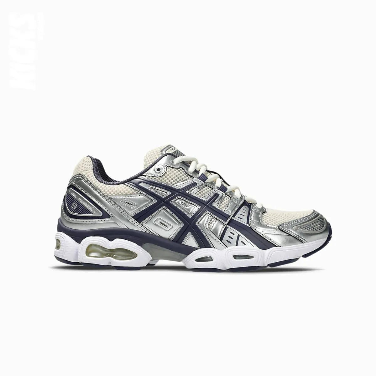 A pair of Asics GEL-NIMBUS 9 running shoes with replacment laces