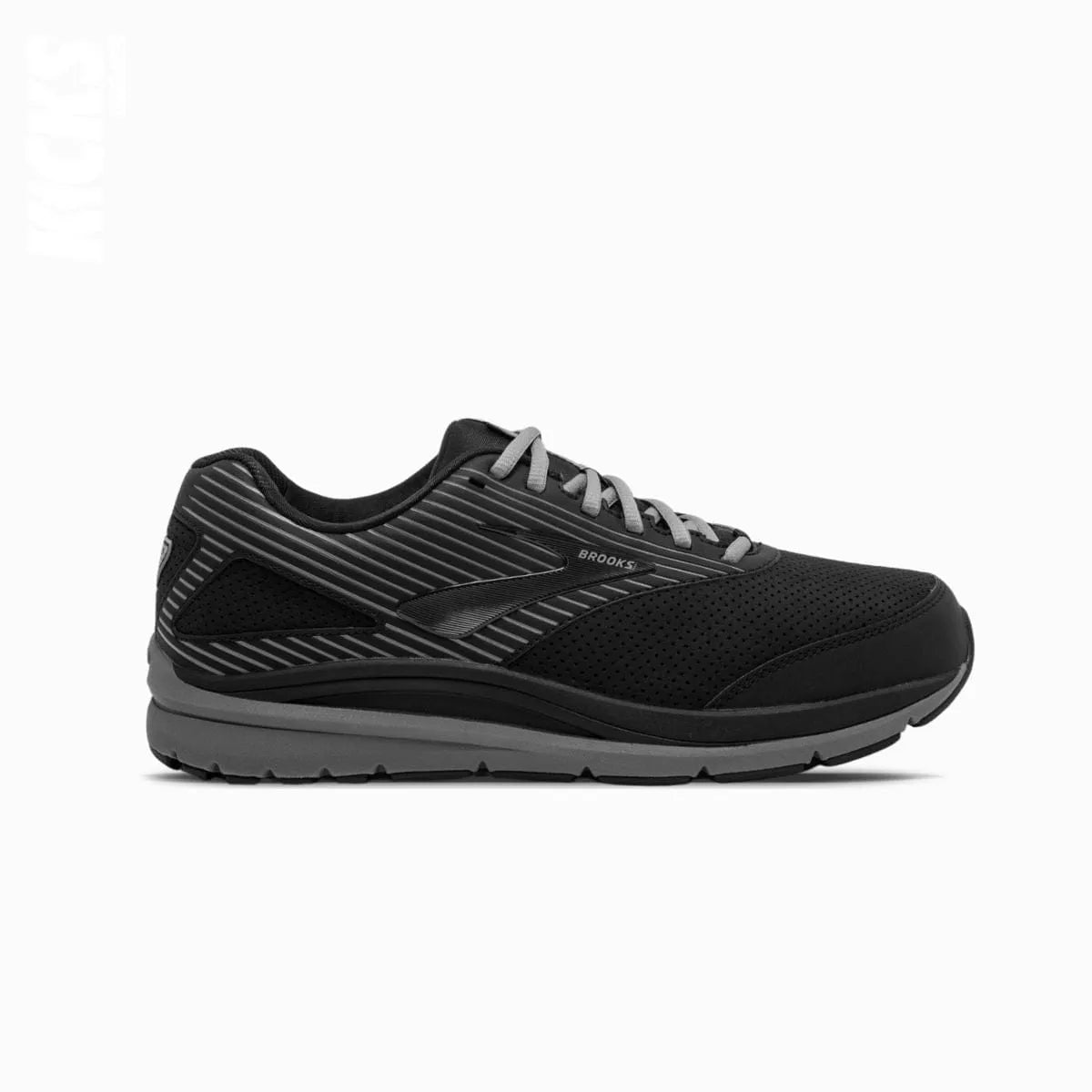 A pair of black Brooks suede shoes with replacement shoe laces, designed for walking shoes.