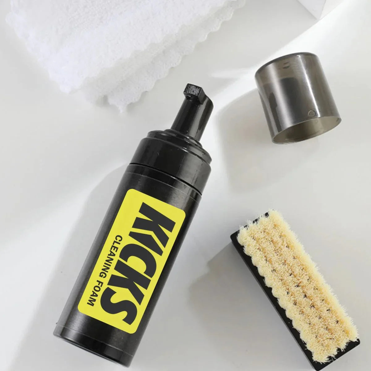 All-in-one Shoe Cleaning Kit with foam cleaner, soft brush, and microfiber cloth for shoes and sneakers.