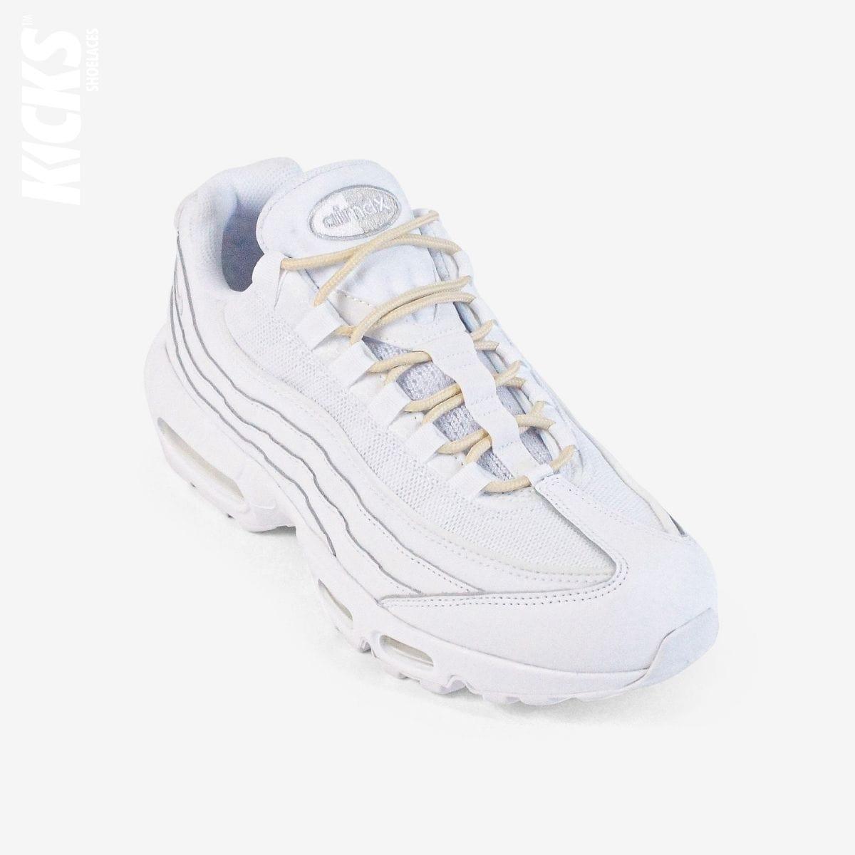 Beige round shoestrings on white sneakers by Kicks Shoelaces