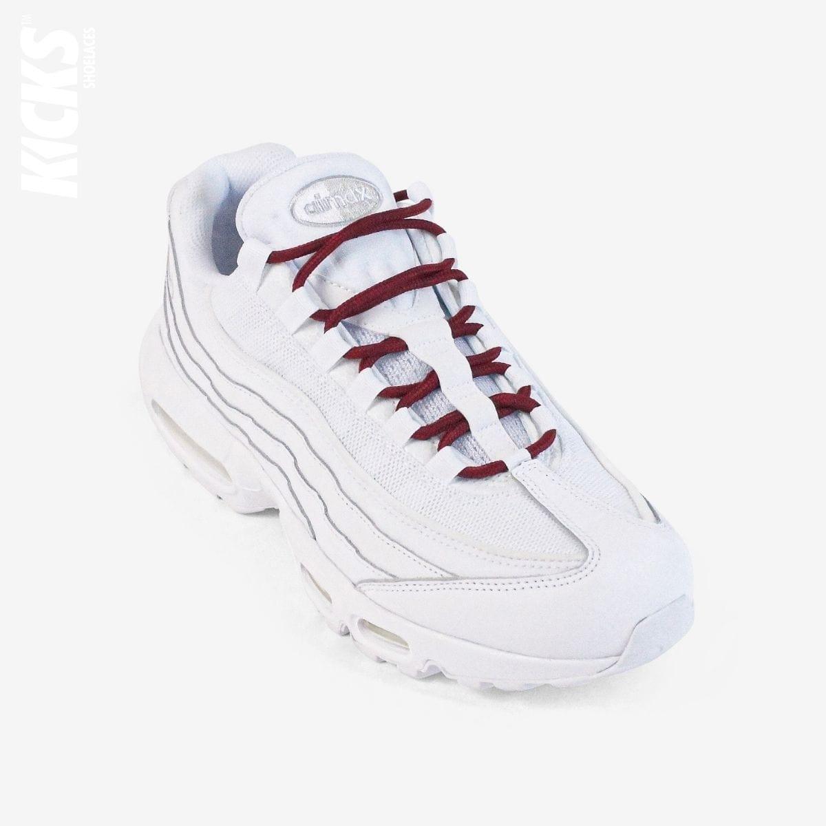 Dark red round shoestrings on white sneakers by Kicks Shoelaces