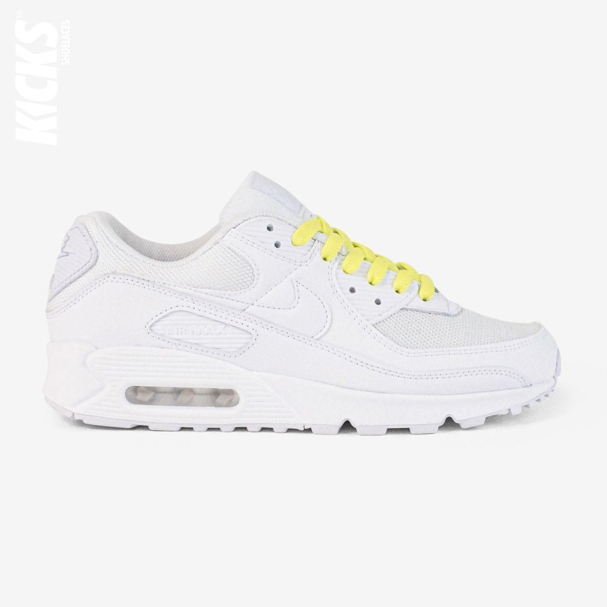 Fluorescent yellow shoelaces on white lifestyle sneakers, a stylish lace upgrade for everyday shoes by Kicks Shoelaces