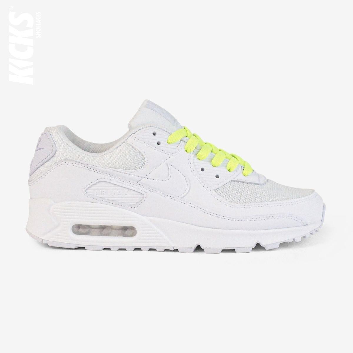 Fluorescent green shoelaces on white lifestyle sneakers, a stylish lace upgrade for everyday shoes by Kicks Shoelaces