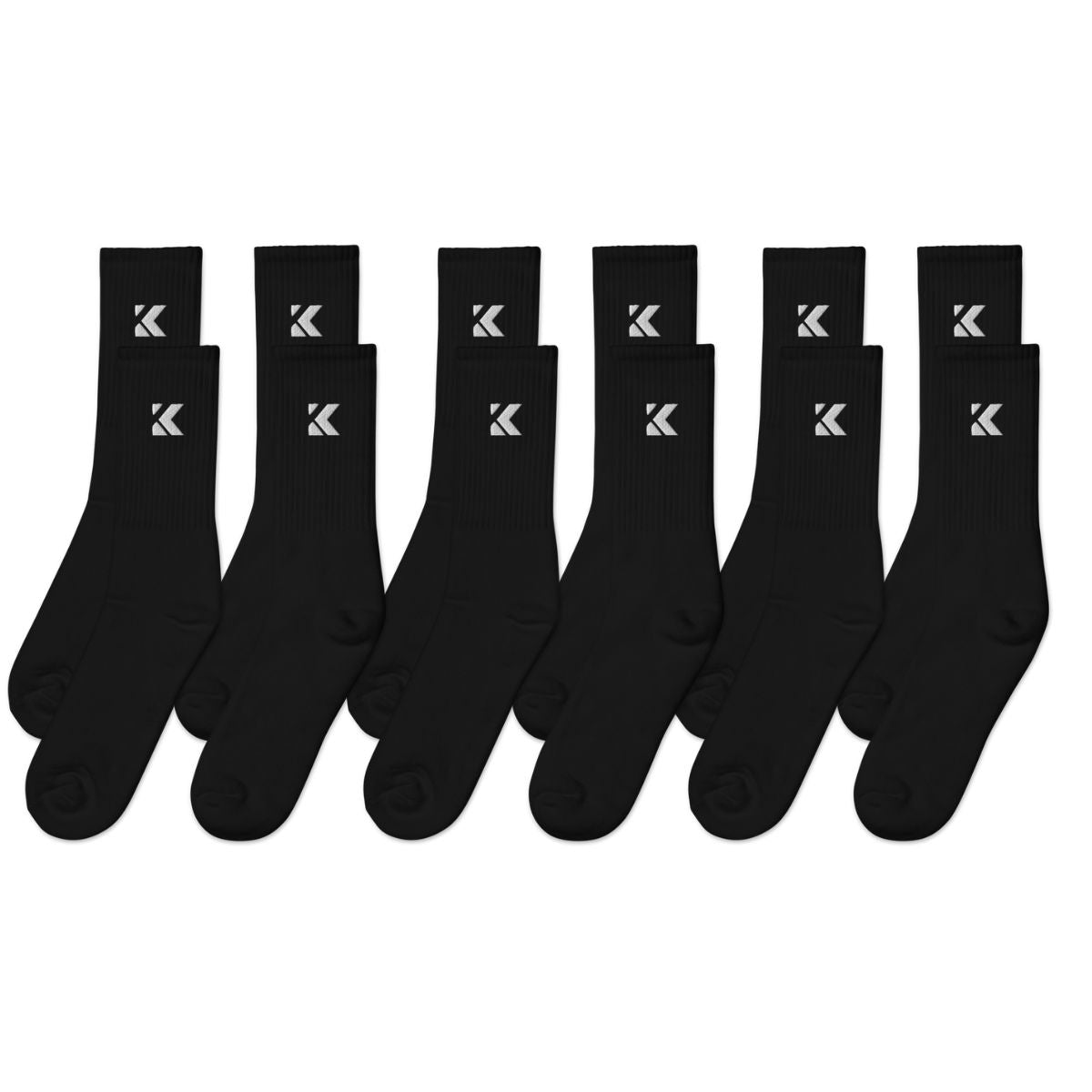 Set of black crew socks with a kicks logo on a white background