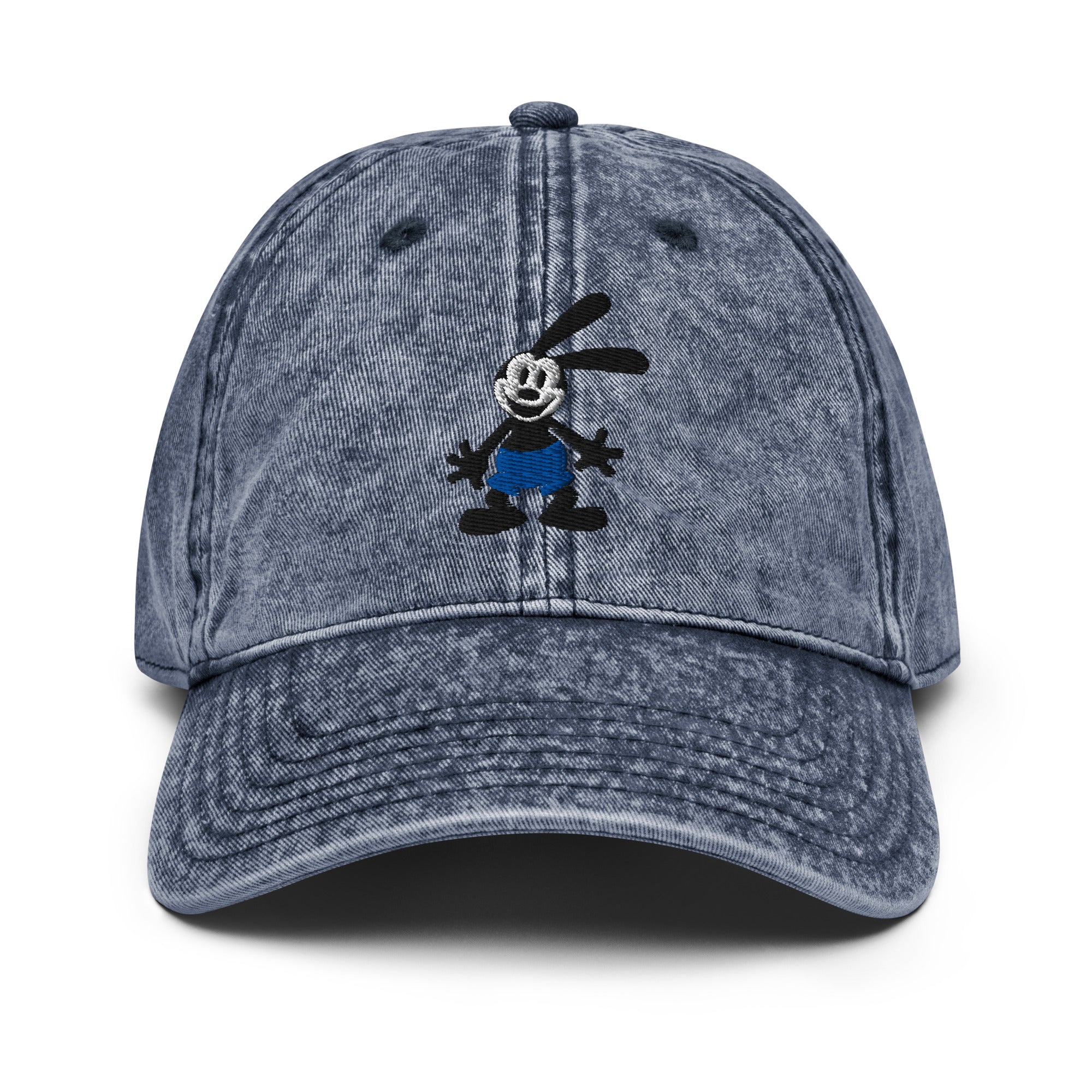 Navy vintage cap featuring a 1928 Oswald design from Disney’s early animation era on a washed-out hat