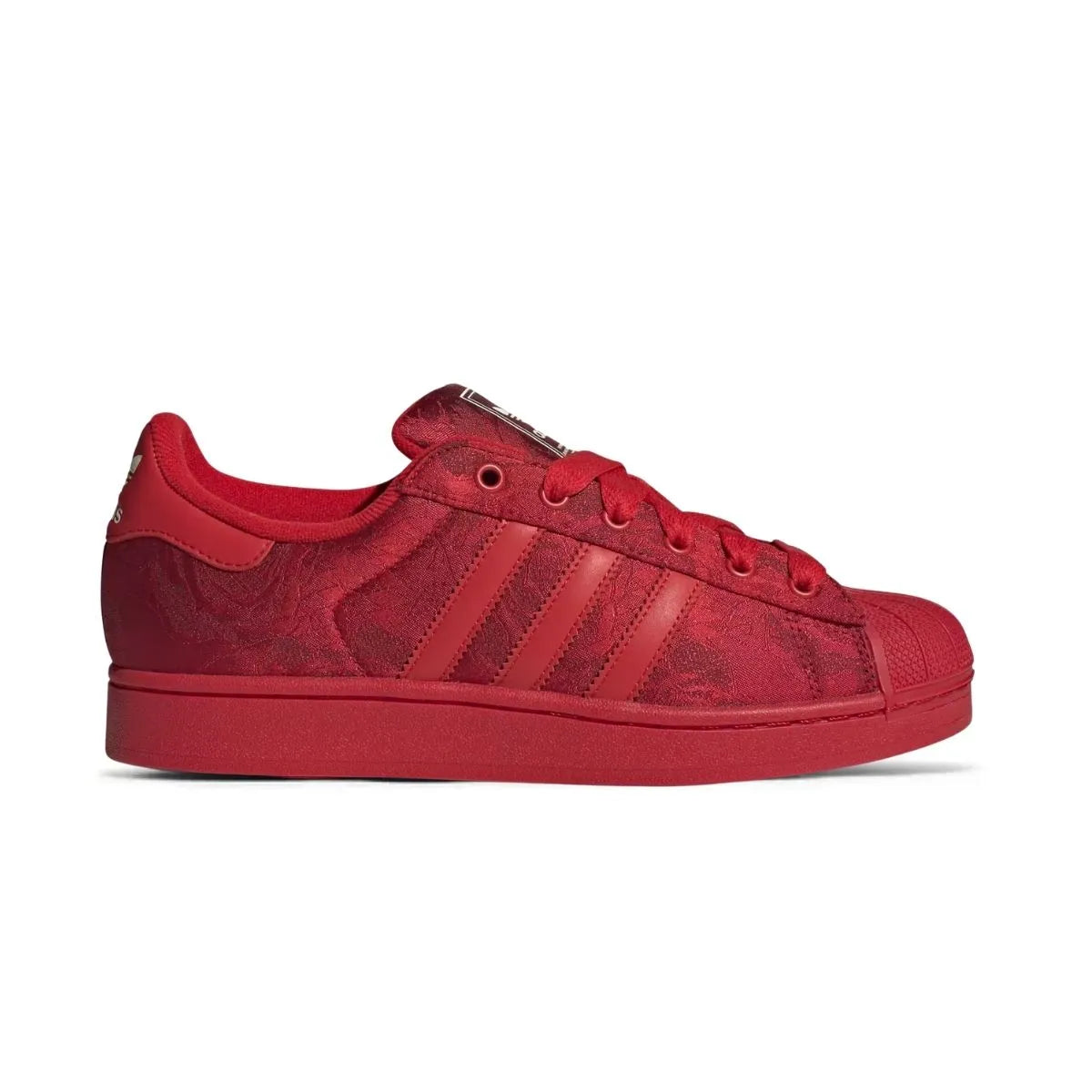 Red replacement laces on adidas Superstar sneakers by Kicks Shoelaces