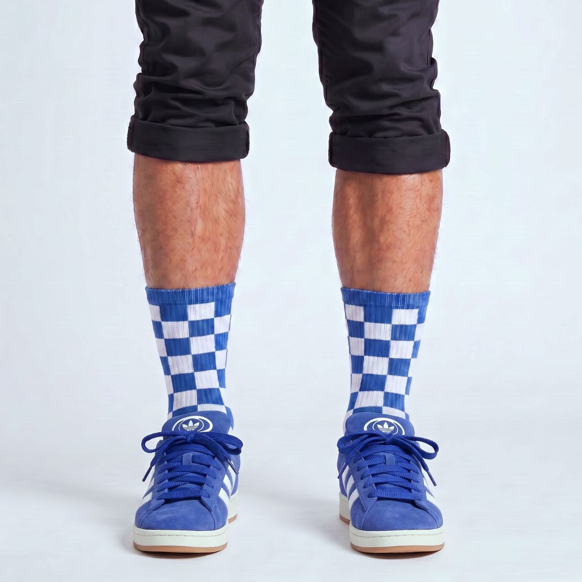 Model wearing Blue Adidas Campus 00s with Royal Blue 15mm wide replacement laces in a clean studio setting by Kicks Shoelaces