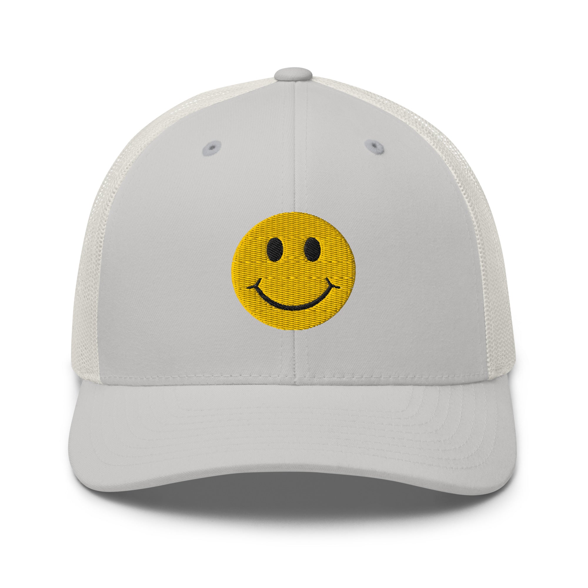 Silver smiley face embroidered trucker hat with adjustable mesh back, perfect for casual wear and streetwear style.